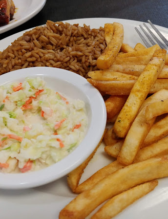 Seasoned fries and rice from Skeebo's Soul Food Kitchen